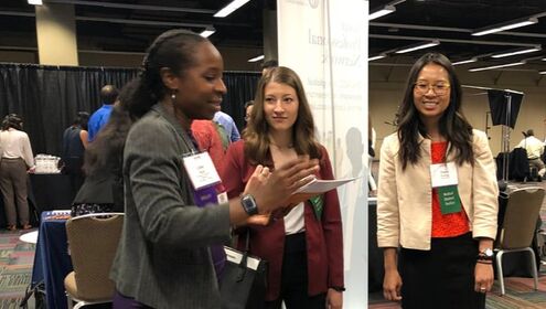 Dr. Lase Ajayi talks about being a pediatric and adult palliative care physician with students at the annual American Medical Association medical student expo. 